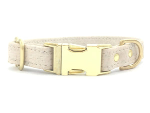 Luxury ivory white vegan cork leather dog and puppy collar with brass buckle and solid brass hardware, by Noggins & Binkles, made in the UK.