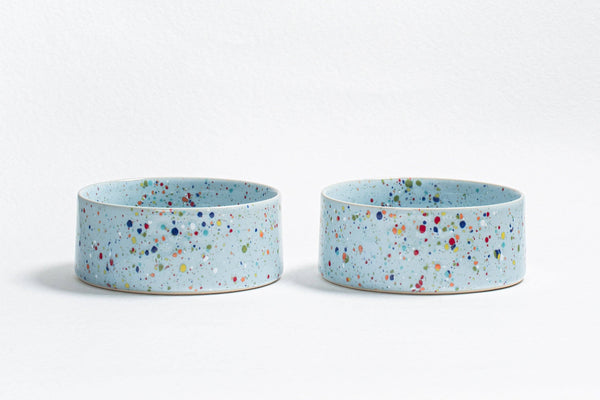 Ceramic dog bowl blue speckles for food and water.