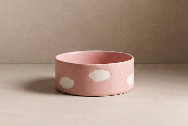 Ceramic dog bowl with pink clouds design