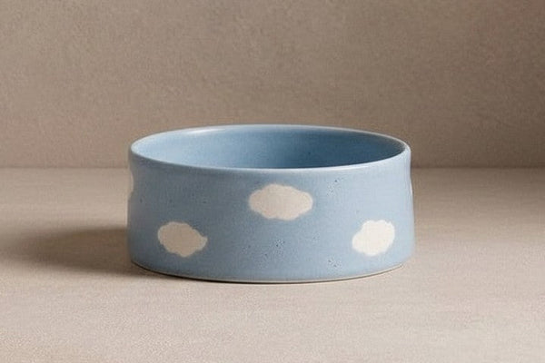 Ceramic dog and puppy bowl with blue clouds design