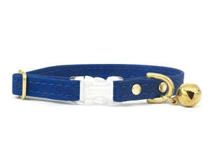 Blue vegan cork leather breakaway safety cat collar with luxury brass bell, made in the UK.