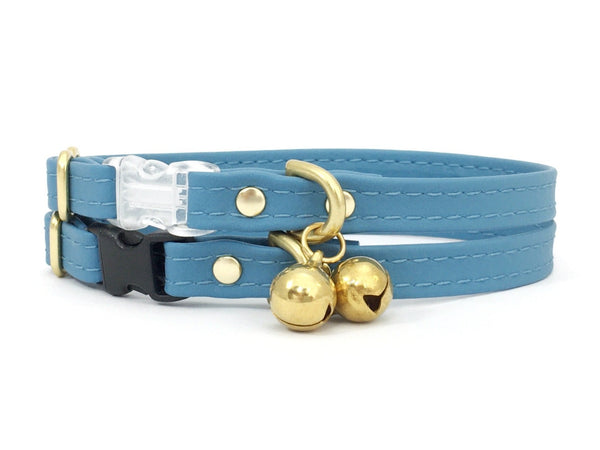 Light cornflower blue vegan silicone leather cat collar with breakaway safety buckle and brass bell.