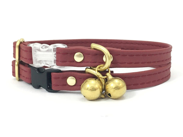 Burgundy vegan silicone leather cat collar with luxury brass bell, made in the UK.