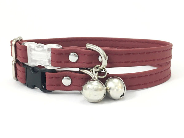 Burgundy cat collar in ethical vegan silicone leather with silver bell.