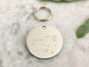 Moon and stars cat ID tag in silver stainless steel, personalised and engraved in the UK.