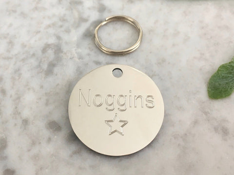 Star cat ID tag in luxury silver stainless steel, personalised and engraved in the UK.