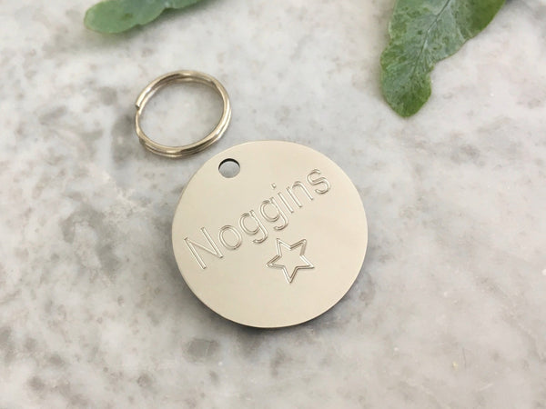 Star dog and puppy ID tag in silver stainless steel, personalised and engraved.