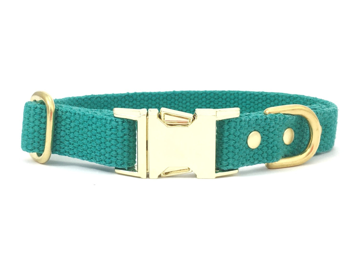 Emerald green dog and puppy collar in natural cotton webbing and luxury brass, handmade in the UK.