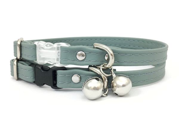 Grey vegan silicone leather cat collar with breakaway safety buckle and silver bell.