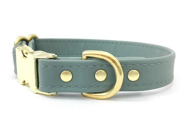 Grey silicone dog collar in vegan leather with brass buckle, waterproof and stink proof. 