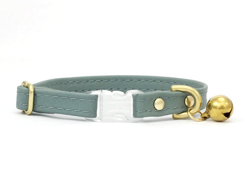 Grey vegan silicone leather breakaway safety cat collar with luxury brass bell, made in the UK.