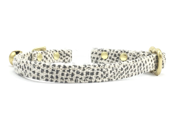 Breakaway safety cat collar in grey polka dot fabric with transparent buckle, by Noggins & Binkles