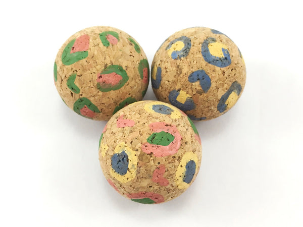 Natural cat ball toys in funky leopard print pattern made from sustainable cork bark and vegan and natural paint.