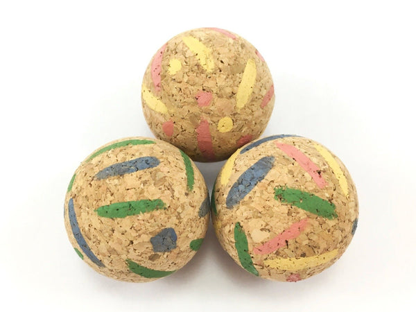 Interactive cat ball toys made from eco friendly and natural cork bark in a funky stripes and spots design