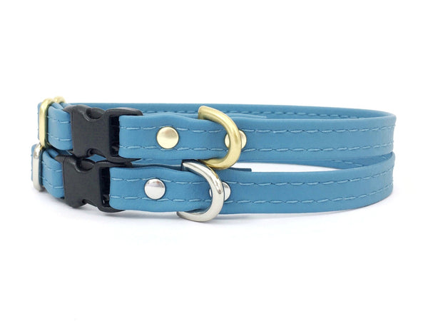 Light blue miniature dog and puppy collar in vegan silicone leather with luxury brass hardware.