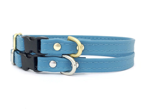 Light blue miniature dog and puppy collar in vegan silicone leather with luxury brass hardware.