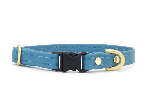 Light blue miniature dog collar in vegan silicone leather and luxury brass. Waterproof and scratch-proof. 