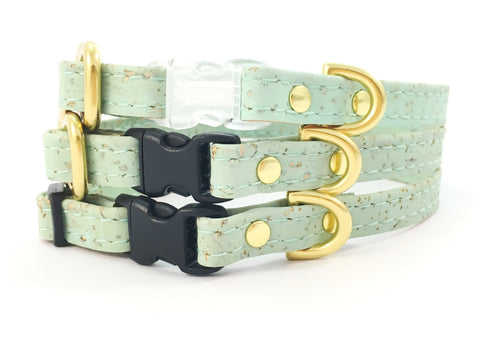 Tiny green dog collars in mint green vegan leather with solid brass gold hardware, suitable for toy breeds and made in the UK