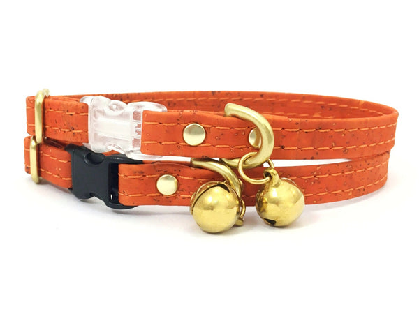 Orange cat collar in vegan cork leather with luxury brass bell, made in the UK.