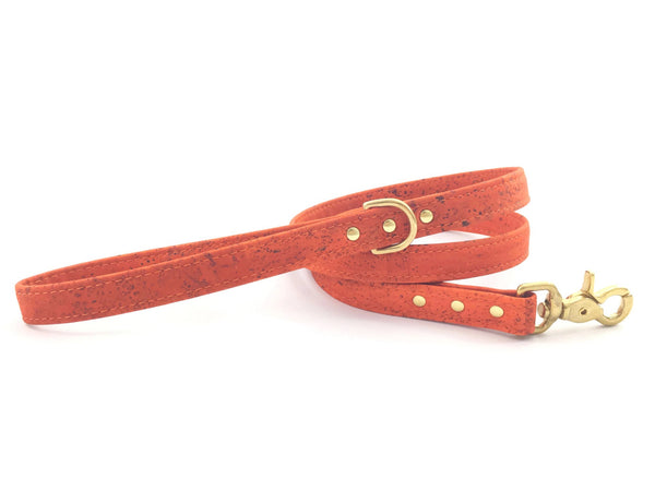 Unique dog lead in orange vegan leather made from sustainable vegan cork leather with solid brass trigger snap hook and matching collar available