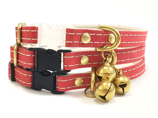 Luxury red vegan leather cat collar with unique contrasting stitching, breakaway safety buckle and brass bell