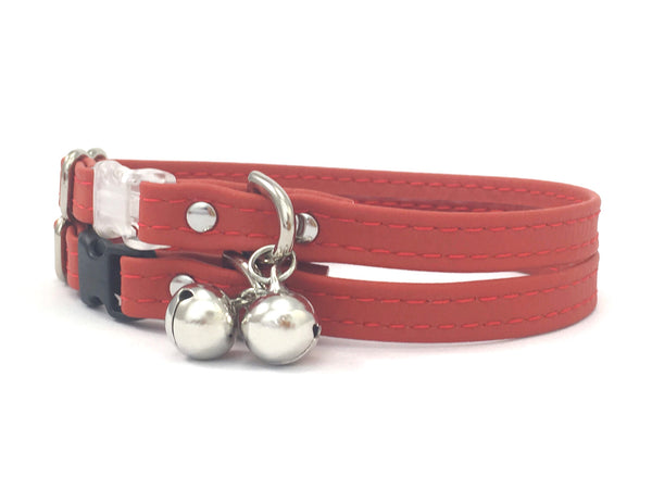 Red silicone leather cat collar with silver bell, waterproof and scratchproof, made in the UK.
