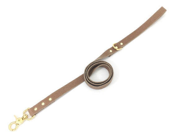 Tan brown dog lead in cotton webbing and luxury brass, made in the UK.