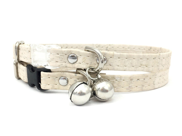 White vegan cork leather cat collar with silver bell and breakaway buckle, made in the UK.