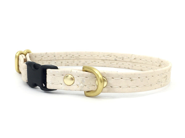 White vegan cork leather miniature dog and puppy collar with luxury brass hardware, made in the UK.
