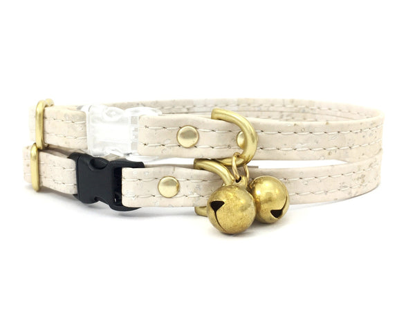 White cat collar in vegan cork leather with luxury brass bell and breakaway safety buckle.