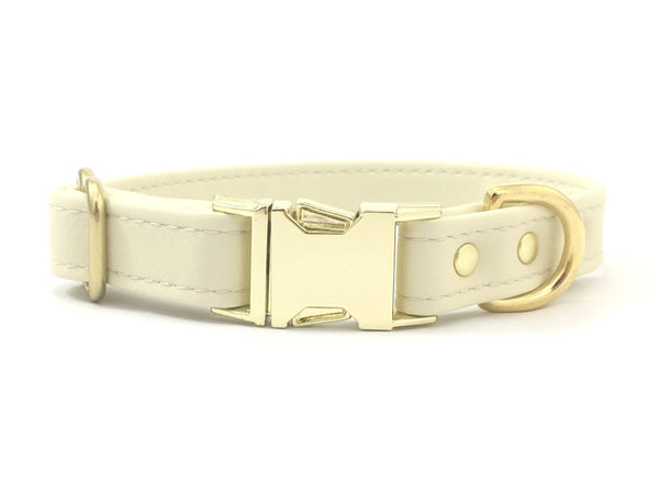 White silicone dog collar in ivory white vegan silicone leather with brass buckle